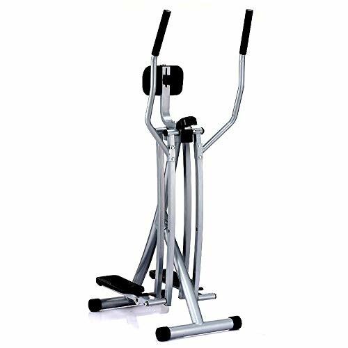 Compact elliptical exercise machine with handlebars and foot pedals.