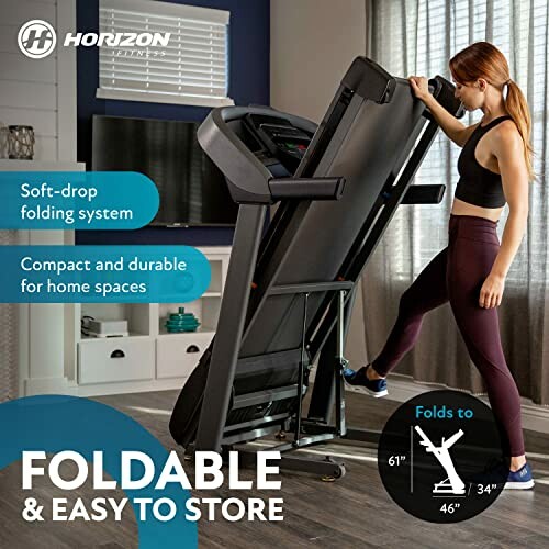 Woman folding a compact treadmill in a home setting.