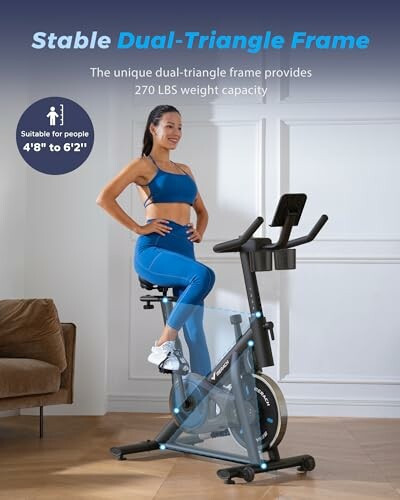 Woman on exercise bike with dual-triangle frame.