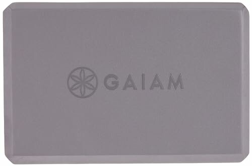 Gray Gaiam yoga block with logo