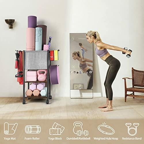 Woman exercising with dumbbells in front of a mirror near a storage rack with yoga mats, kettlebell, and other fitness equipment.