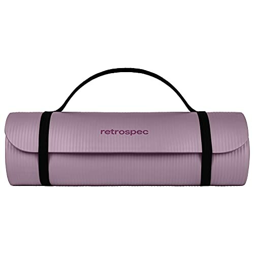 Purple yoga mat rolled up with a black carrying strap