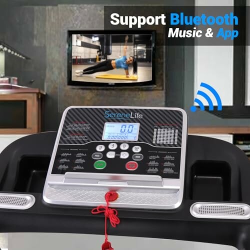 Treadmill console with Bluetooth support and TV in background